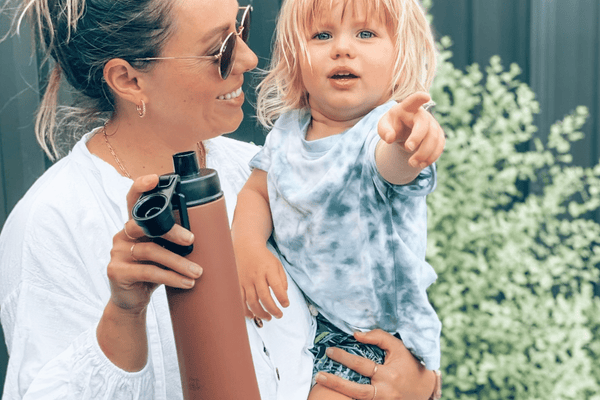 Mum with a child and a tuscan Fressko infuser drink bottle