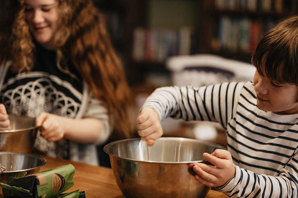 Kids making easter eggs at home 