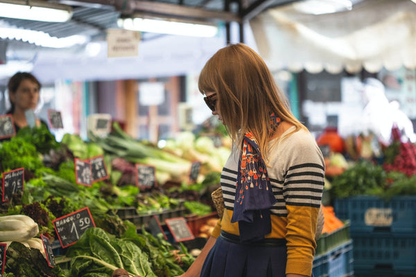 woman shopping in local produce market